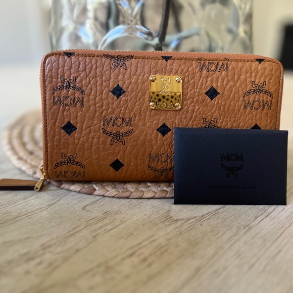 MCM Handbags - MCM Cognac Visetos Leather Zippy Wallet
